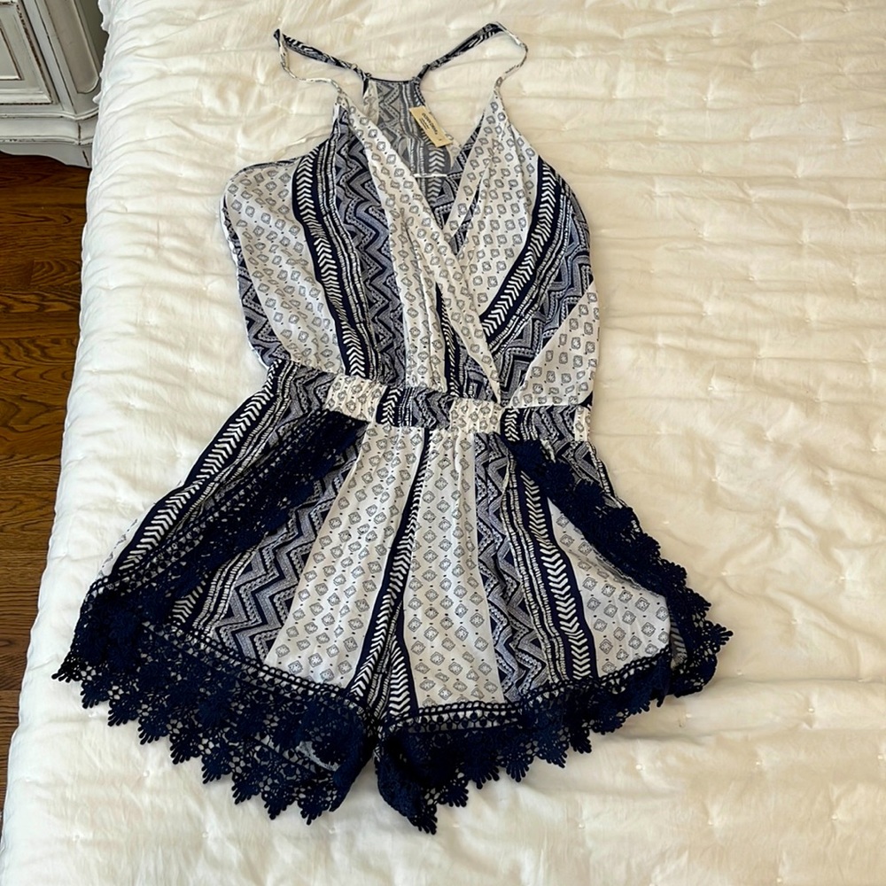 Blue and white patterned romper in size S